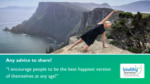 Stacey doing a yoga pose on a rock cliff overlooking Cape Pillar in the distance. Her quote says, “I encourage people to be the best happiest version of themselves at any age!”